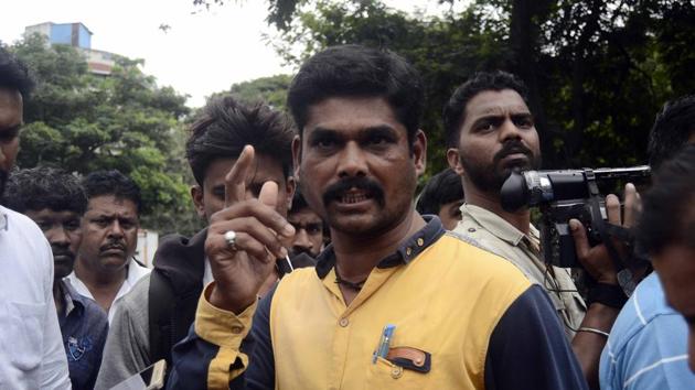 Pravin Andure, brother of Sachin Andure who is an accused in Narendra Dabholkar murder case, outside a court in Pune, on Sunday, August 19, 2018.(Ravindra Joshi / HT Photo)