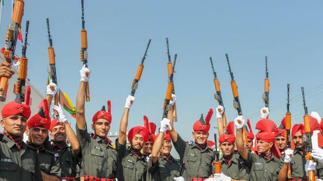 Newly inducted army soldiers raise their guns after the graduation and attestation parade at Army’s JAKLI Regiment Centre in Srinagar. As many as 256 young men from Jammu and Kashmir were formally inducted as soldiers in the army after completing a rigorous one-year training. (PTI) Newly inducted army soldiers raise their guns after the graduation and attestation parade at Army’s JAKLI Regiment Centre in Srinagar. As many as 256 young men from Jammu and Kashmir were formally inducted as soldiers in the army after completing a rigorous one-year training. (PTI)