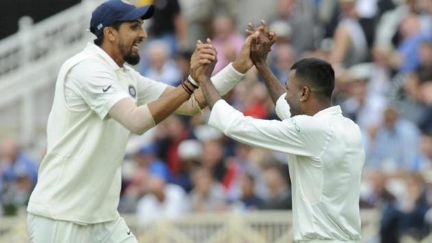 India's Hardik Pandya, right, celebrates with teammate Ishant Sharma the dismissal of England's Jonny Bairstow.(AP)