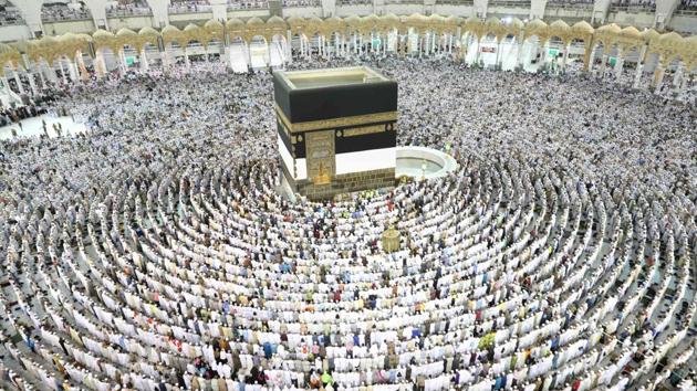 Muslim worshippers perform prayers around the Kaaba, Islam's holiest shrine, at the Grand Mosque in Saudi Arabia's holy city of Mecca.(AFP)