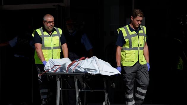 The body of a man who tried to attack a police station is carried out of the premises in Cornella near the northeastern Spanish city of Barcelona on August 20.(AFP Photo) The body of a man who tried to attack a police station is carried out of the premises in Cornella near the northeastern Spanish city of Barcelona on August 20.(AFP Photo)