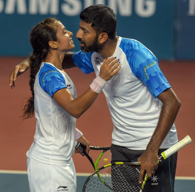 Palembang: Indian tennis players Rohan Bopanna and Ankita Raina celebrate after beating their Korean counterparts Na RJ Kim and Jeamoon Lee in the mix-doubles tennis match at the 18th Asian Games 2018 at Palembang in Indonesia on Tuesday, Aug 21, 2018. (PTI Photo/Vijay Verma) (PTI8_21_2018_000122B) (PTI) Palembang: Indian tennis players Rohan Bopanna and Ankita Raina celebrate after beating their Korean counterparts Na RJ Kim and Jeamoon Lee in the mix-doubles tennis match at the 18th Asian Games 2018 at Palembang in Indonesia on Tuesday, Aug 21, 2018. (PTI Photo/Vijay Verma) (PTI8_21_2018_000122B) (PTI)