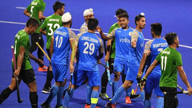 Indian men’s hockey team in action during their Asian Games 2018 match against Indonesia.(AFP)