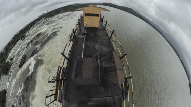 Aspherical panoramic view of the Khadakwasla dam, which is 100 per cent full, on Monday. The left side of the picture represents water released from the dam, while the right side represents the dam storage. (Pratham Gokhale/HT Photo) Aspherical panoramic view of the Khadakwasla dam, which is 100 per cent full, on Monday. The left side of the picture represents water released from the dam, while the right side represents the dam storage. (Pratham Gokhale/HT Photo)