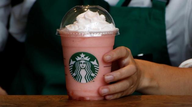 A waitress prepares a beverage at a branch of Starbucks coffee in Tokyo. (REUTERS File Photo) A waitress prepares a beverage at a branch of Starbucks coffee in Tokyo. (REUTERS File Photo)