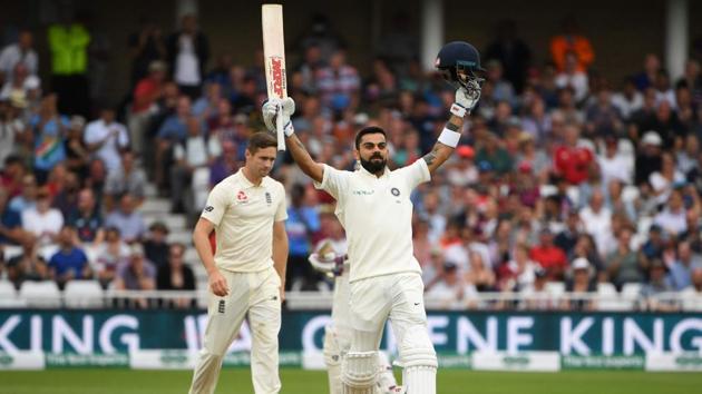 India's captain Virat Kohli celebrates scoring his century during the third day of the third Test. (AFP)