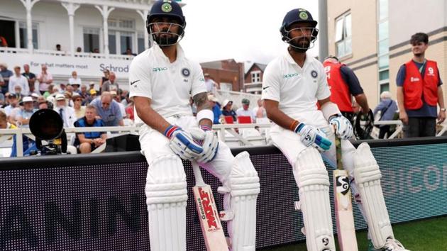 India's Virat Kohli and Cheteshwar Pujara before the start of play on Day 3. (REUTERS)