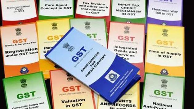 Booklets on GST were distributed by the Central Board of Direct Taxes at a function organised to celebrate GST Day, in New Delhi on July 1. (PTI File Photo) Booklets on GST were distributed by the Central Board of Direct Taxes at a function organised to celebrate GST Day, in New Delhi on July 1. (PTI File Photo)