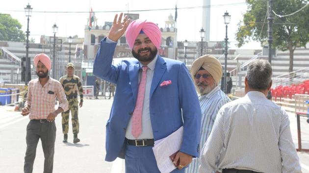 Congress leader and Punjab minister Navjot Singh Sidhu, facing criticism for hugging Pakistan’s army chief and visiting the country, said on Tuesday the gesture was made in an “emotional moment” and that his trip was not politically motivated. “Pakistan army chief said they were making efforts to open corridor to Kartarpur Sahib, what followed was an emotional moment,” Sidhu said. (Narinder Nanu / AFP File) Congress leader and Punjab minister Navjot Singh Sidhu, facing criticism for hugging Pakistan’s army chief and visiting the country, said on Tuesday the gesture was made in an “emotional moment” and that his trip was not politically motivated. “Pakistan army chief said they were making efforts to open corridor to Kartarpur Sahib, what followed was an emotional moment,” Sidhu said. (Narinder Nanu / AFP File)