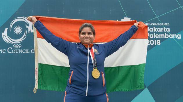 Gold medalist shooter Rahi Sarnobat holds the Indian tricolour after medal ceremony of women's 25m pistol event during the 18th Asian Games at Palembang. (PTI) Gold medalist shooter Rahi Sarnobat holds the Indian tricolour after medal ceremony of women's 25m pistol event during the 18th Asian Games at Palembang. (PTI)