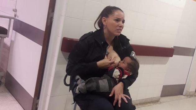 Celeste Jaqueline Ayala, woman police sergeant in Argentina on duty breastfed a crying baby to calm her down, and following this rare gesture she has now been promoted to the rank of an officer. (Marcos Heredia via Facebook) Celeste Jaqueline Ayala, woman police sergeant in Argentina on duty breastfed a crying baby to calm her down, and following this rare gesture she has now been promoted to the rank of an officer. (Marcos Heredia via Facebook)