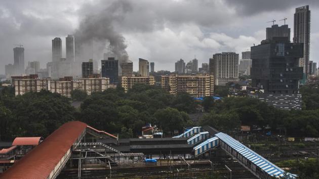 Four people were killed and at least 16 injured in a major fire at the Crystal Tower residential apartments near Hindmata Cinema in Mumbai’s Parel area on Wednesday. Rescuers faced a tough time to evacuate people from the 12th floor, where the fire broke out, and floors above as billowing smoke blocked all staircases and other exits, while the building’s own fire fighting system was not working. (Pratik Chorge / HT Photo) Four people were killed and at least 16 injured in a major fire at the Crystal Tower residential apartments near Hindmata Cinema in Mumbai’s Parel area on Wednesday. Rescuers faced a tough time to evacuate people from the 12th floor, where the fire broke out, and floors above as billowing smoke blocked all staircases and other exits, while the building’s own fire fighting system was not working. (Pratik Chorge / HT Photo)