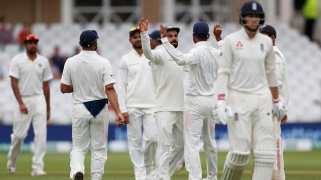 India players celebrate after taking the wicket of England's Joe Root. (REUTERS) India players celebrate after taking the wicket of England's Joe Root. (REUTERS)