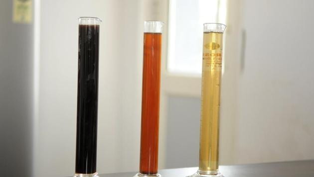 (Left to right) The initial, first processed and further processed stages of leachate at the Bandhwari landfill site. (Parveen Kumar/HT Photo) (Left to right) The initial, first processed and further processed stages of leachate at the Bandhwari landfill site. (Parveen Kumar/HT Photo)