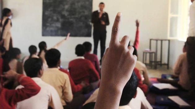 Students attend a class at Shaheed Balwant Singh Government Model Senior Secondary School , in Ujholi , Kot Kasim, of District Alwar , Rajasthan(HT File Photo)