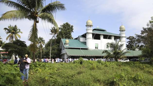 Two Muslim men greet each other after offering Eid prayers at a mosque on the flood affected island of Kunjunnikkara, outskirts of Kochi in the southern state of Kerala, India,.(AP Representative Photo)