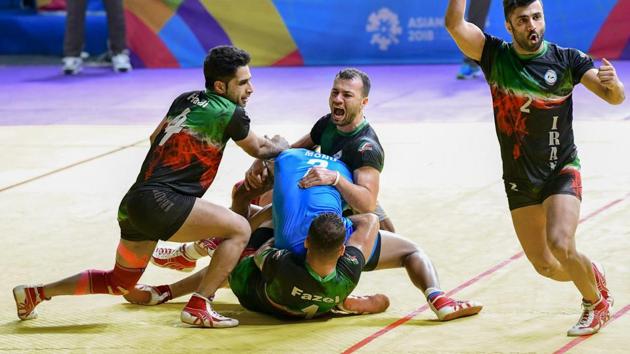 Indian men’s kabaddi team in action during their Asian Games 2018 semifinal match against Iran.(PTI)