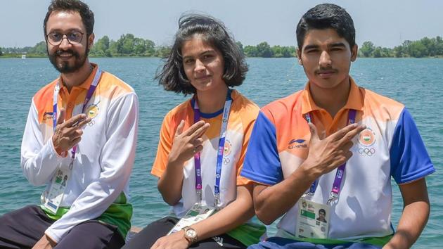 Indian 10m Air Pistol team -Saurabh Chaudhary, Manu Bhaker and Abhishek Verma - pose after a practice session in Jakarta.(PTI)