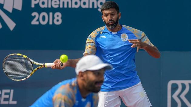 Indian tennis players Rohan Bopanna and Divij Sharan in action at the Asian Games 2018 at Palembang, Indonesia.(PTI)