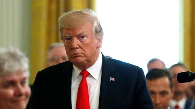 US President Donald Trump departs after awarding a Medal of Honor posthumously to Air Force Technical Sergeant John A. Chapman in the East Room at the White House in Washington on August 22, 2018.(REUTERS) US President Donald Trump departs after awarding a Medal of Honor posthumously to Air Force Technical Sergeant John A. Chapman in the East Room at the White House in Washington on August 22, 2018.(REUTERS)