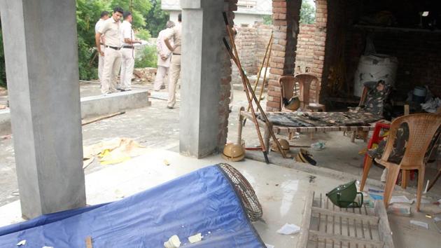 Police personnel were deployed at the namaz ghar of Titoli village in Rohtak after it was vandalised by a mob on Wednesday, August 22, 2018.(Manoj Dhaka / HT Photo)