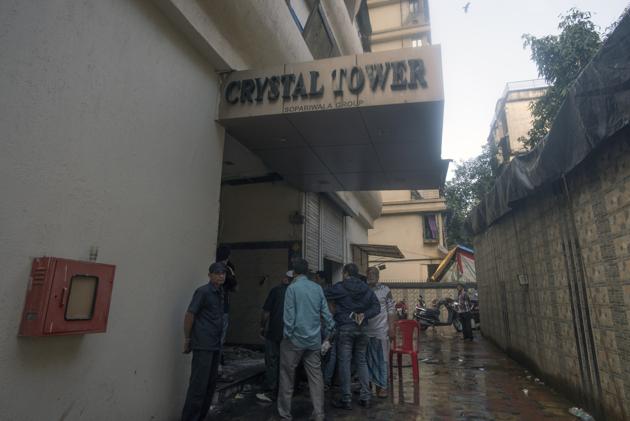Mumbai, India - Aug. 23, 2018: People stand in the lobby of the Crystal tower at Parel in Mumbai, India, on Thursday, August 23, 2018. (Photo by Pratik Chorge/Hindustan Times) (Pratik Chorge/HT Photo) Mumbai, India - Aug. 23, 2018: People stand in the lobby of the Crystal tower at Parel in Mumbai, India, on Thursday, August 23, 2018. (Photo by Pratik Chorge/Hindustan Times) (Pratik Chorge/HT Photo)