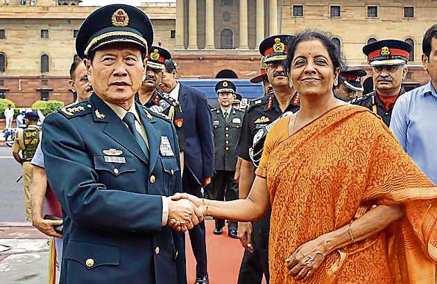 Defence Minister Nirmala Sitharaman welcomes the Defence Minister of China Wei Fenghe at South Block in New Delhi.(HT Photo)