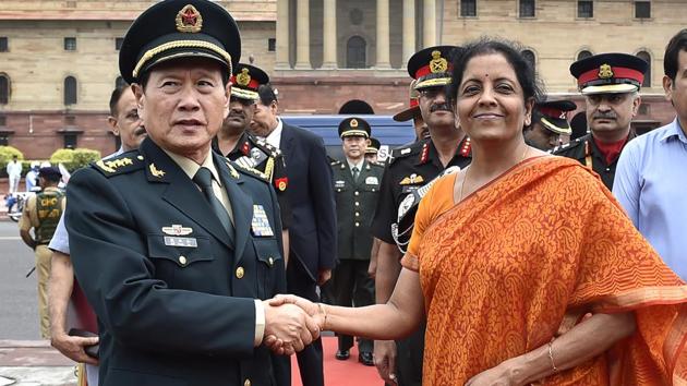 Defence Minister Nirmala Sitharaman welcomes her Chinese counterpart Wei Fenghe at South Block in New Delhi. Wei Fenghe’s ongoing visit to India will strengthen bilateral military ties and enhance trust, China’s state media has said, adding it will help in implementing the Wuhan consensus reached between Prime Minister Narendra Modi and President Xi Jinping. (Ajay Aggarwal / HT Photo) Defence Minister Nirmala Sitharaman welcomes her Chinese counterpart Wei Fenghe at South Block in New Delhi. Wei Fenghe’s ongoing visit to India will strengthen bilateral military ties and enhance trust, China’s state media has said, adding it will help in implementing the Wuhan consensus reached between Prime Minister Narendra Modi and President Xi Jinping. (Ajay Aggarwal / HT Photo)