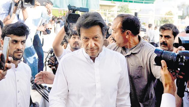 Imran Khan (C) arrives at the Parliament building to attend a special session in Islamabad on May 16, 2016 (AFP File Photo) Imran Khan (C) arrives at the Parliament building to attend a special session in Islamabad on May 16, 2016 (AFP File Photo)