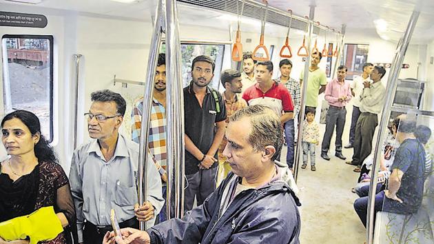 People visit the Metro information centre set up at Balgandharv Rang Mandir on Sunday. The information centre is a life-size model of Pune Metro coach, so that residents get a glimpse of how the metro coaches will look like when launched. (RAVINDRA JOSHI/HT PHOTO) People visit the Metro information centre set up at Balgandharv Rang Mandir on Sunday. The information centre is a life-size model of Pune Metro coach, so that residents get a glimpse of how the metro coaches will look like when launched. (RAVINDRA JOSHI/HT PHOTO)