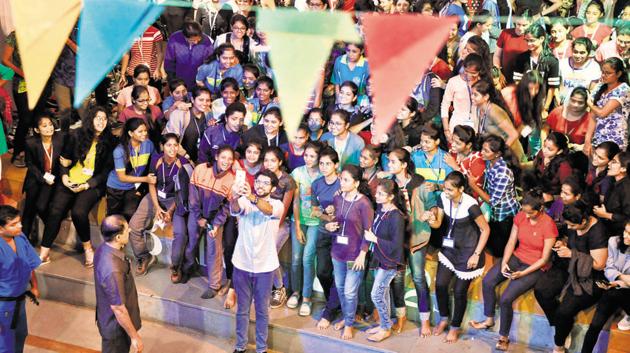 Aaditya Thackeray, president of Yuva Sena, a youth wing of Shiv Sena, takes a selfie with participants at a self defence training camp at Dr Bhanuben Nanavati College of Architecture (BNCA) for women in Karvenagar on Monday. (HT PHOTO) Aaditya Thackeray, president of Yuva Sena, a youth wing of Shiv Sena, takes a selfie with participants at a self defence training camp at Dr Bhanuben Nanavati College of Architecture (BNCA) for women in Karvenagar on Monday. (HT PHOTO)