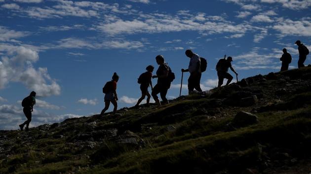 Pilgrims ascend and descend Croagh Patrick mountain. “A lot of Catholics have gone a-la-carte, but being Catholic is very serious,” said Marie Campbell, who joined thousands scaling the mountain in honour of Saint Patrick, Ireland’s patron saint. “Our Catholic faith stands for life. It’s the very centre of being Catholic. We cherish life, life is sacred, and a lot of Catholics need to be reminded of these things.” (Clodagh Kilcoyne / REUTERS) Pilgrims ascend and descend Croagh Patrick mountain. “A lot of Catholics have gone a-la-carte, but being Catholic is very serious,” said Marie Campbell, who joined thousands scaling the mountain in honour of Saint Patrick, Ireland’s patron saint. “Our Catholic faith stands for life. It’s the very centre of being Catholic. We cherish life, life is sacred, and a lot of Catholics need to be reminded of these things.” (Clodagh Kilcoyne / REUTERS)
