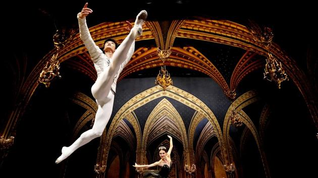 Dancers Kimin Kim and Yulia Stepanova of the St Petersburg Ballet perform Swan Lake during a photo call at the Coliseum theatre in London, England. (Frank Augstein / AP Photo)