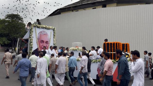 Delhi BJP supporters and workers take out a procession as part of the Asthi Kalash Yatra of former Prime Minister Late Atal Bihari Vajpayee at Bhai Vir Singh Marg near Gole Market in New Delhi. (Sonu Mehta / HT Photo)