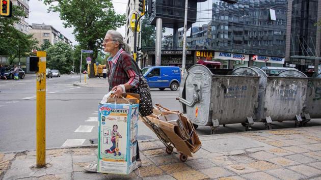 Most of the collectors are middle-aged or elderly, like former secretary Penka, 63,with two-thirds of them working seven days a week, carrying huge loads on foot or with small makeshift carts, and earning less than 10 leva ($6/5 euros) a day. That amounts to a monthly income that comes close to Bulgaria’s official poverty line of 321 leva. (Nikolay Doychinov / AFP)