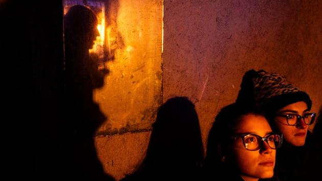 “You can tell a home by its rubbish. Show me people’s rubbish and I can tell you who they are,” says one actor dragging a cart, while another describes a collector’s daily routine while sitting on top of a full garbage container. The unusual performance presents verbatim some of the accounts of the 5,000 or so people who eke out a living in Sofia’s ever-growing rag-and-bone trade. (Dimitar Dilkoff / AFP)