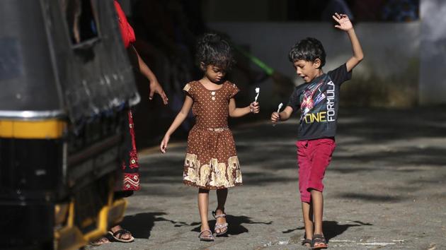 Flood affected children walk to brush their teeth before having a meal at a relief camp set up inside a school in Kochi, Kerala. (AP Photo) Flood affected children walk to brush their teeth before having a meal at a relief camp set up inside a school in Kochi, Kerala. (AP Photo)