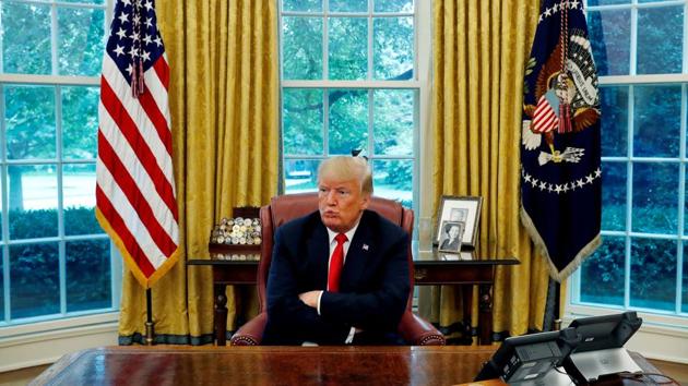 US President Donald Trump reacts to a question during an interview with Reuters in the Oval Office of the White House in Washington. (Leah Millis / REUTERS)