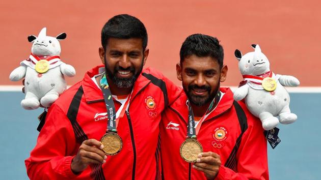 Rohan Bopanna (L) and Divij Sharan (R) clinched another medal for India at the Asian Games 2018 and the first one in tennis, winning the gold medal after beating the Kazakhstan pair of Aleksandr Bublik and Denis Yevseyev. They cruised to a 6-3, 6-4 win in just 52 minutes. (Edgar Su / REUTERS)