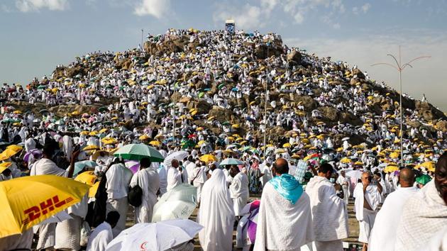 Pilgrims gather on Mount Arafat, also known as Jabal al-Rahma (Mount of Mercy), southeast of the Saudi holy city of Mecca, on Arafat Day which is the climax of the Hajj pilgrimage early. Arafat is the site where Muslims believe the Prophet Mohammed gave his last sermon about 14 centuries ago after leading his followers on the pilgrimage. (Ahmad Al Rubaye / AFP)