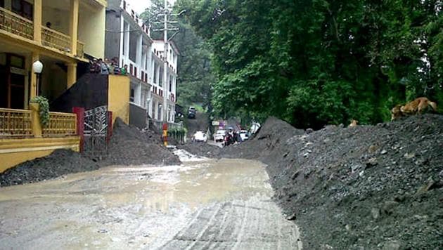 A file photo of Nainital's Mall Road filled with debris after a heavy shower in the region. (HT file photo) A file photo of Nainital's Mall Road filled with debris after a heavy shower in the region. (HT file photo)