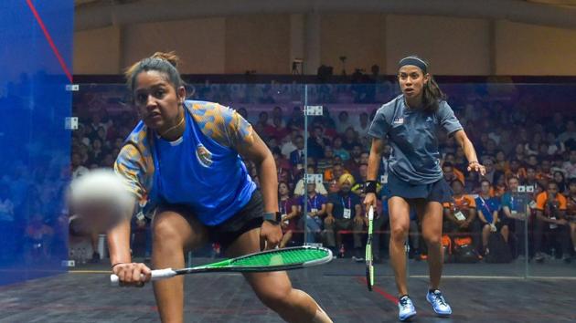 Jakarta: India's Deepika Pallikal and Ann Nicol David of Malaysia in action during the women's squash semifinal match. (PTI)