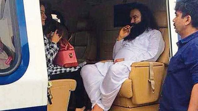 Gurmeet Ram Rahim Singh and his aide, Honeypreet, being flown to Sunaria jail near Rohtak after he was convicted by a CBI court in Panchkula on August 25, 2017.(HT File)