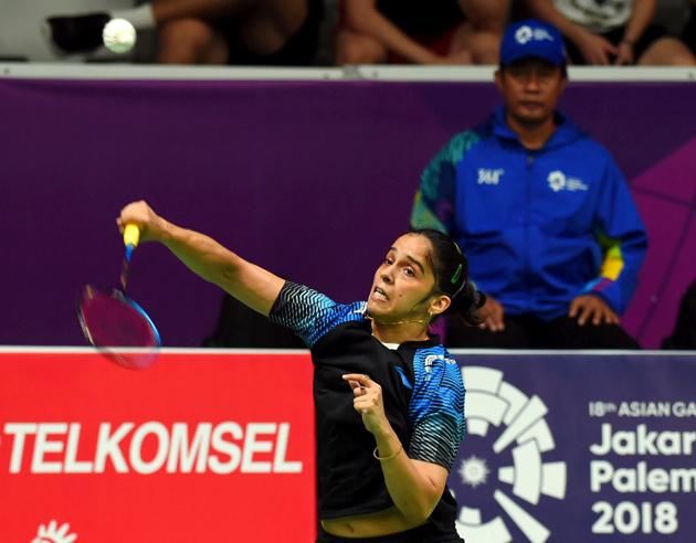 Indian shuttler Saina Nehwal in action against Thailand's R Intanon during women's singles quarter final badminton match. (PTI) Indian shuttler Saina Nehwal in action against Thailand's R Intanon during women's singles quarter final badminton match. (PTI)