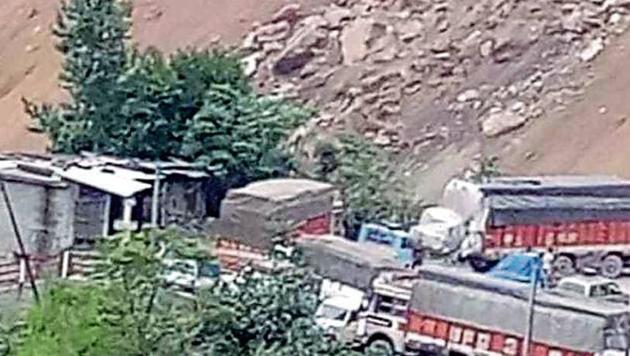 Landslides, triggered by heavy rains, in Ramsoo and Magarkote areas of Ramban district, have completely blocked vehicular movement on the highway since Saturday morning. (HT Photo) Landslides, triggered by heavy rains, in Ramsoo and Magarkote areas of Ramban district, have completely blocked vehicular movement on the highway since Saturday morning. (HT Photo)