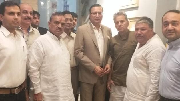 DDCA president Rajat Sharma (centre) met Sanjay Bharadwaj on Saturday night to discuss the issues facing the Delhi and District Cricket Association. (Hindustan Times) DDCA president Rajat Sharma (centre) met Sanjay Bharadwaj on Saturday night to discuss the issues facing the Delhi and District Cricket Association. (Hindustan Times)