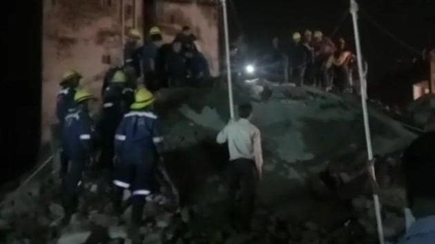 Three persons, including a minor girl, were rescued within an hour after the building collapsed in the Odhav area following rains. (ANI/Twitter) Three persons, including a minor girl, were rescued within an hour after the building collapsed in the Odhav area following rains. (ANI/Twitter)