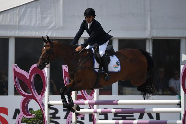 India's Fouaad Mirza competes in the eventing team and individual jumping event at the equestrian competition. (AFP) India's Fouaad Mirza competes in the eventing team and individual jumping event at the equestrian competition. (AFP)