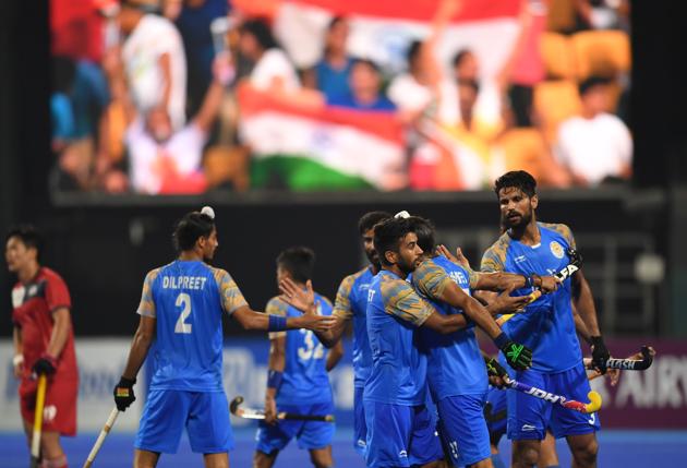 India's players celebrate after scoring a goal against South Korea during the men's hockey pool A match between India and South Korea. (AFP) India's players celebrate after scoring a goal against South Korea during the men's hockey pool A match between India and South Korea. (AFP)