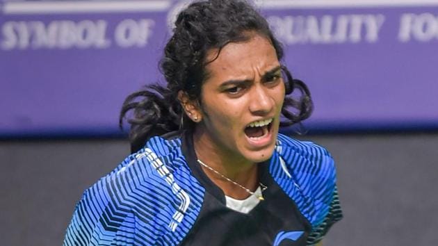 Jakarta: Indian shuttler PV Sindhu exults after winning the women's singles 2nd semifinal match against Japan's Akane Yamaguchi at the 18th Asian Games.(PTI)